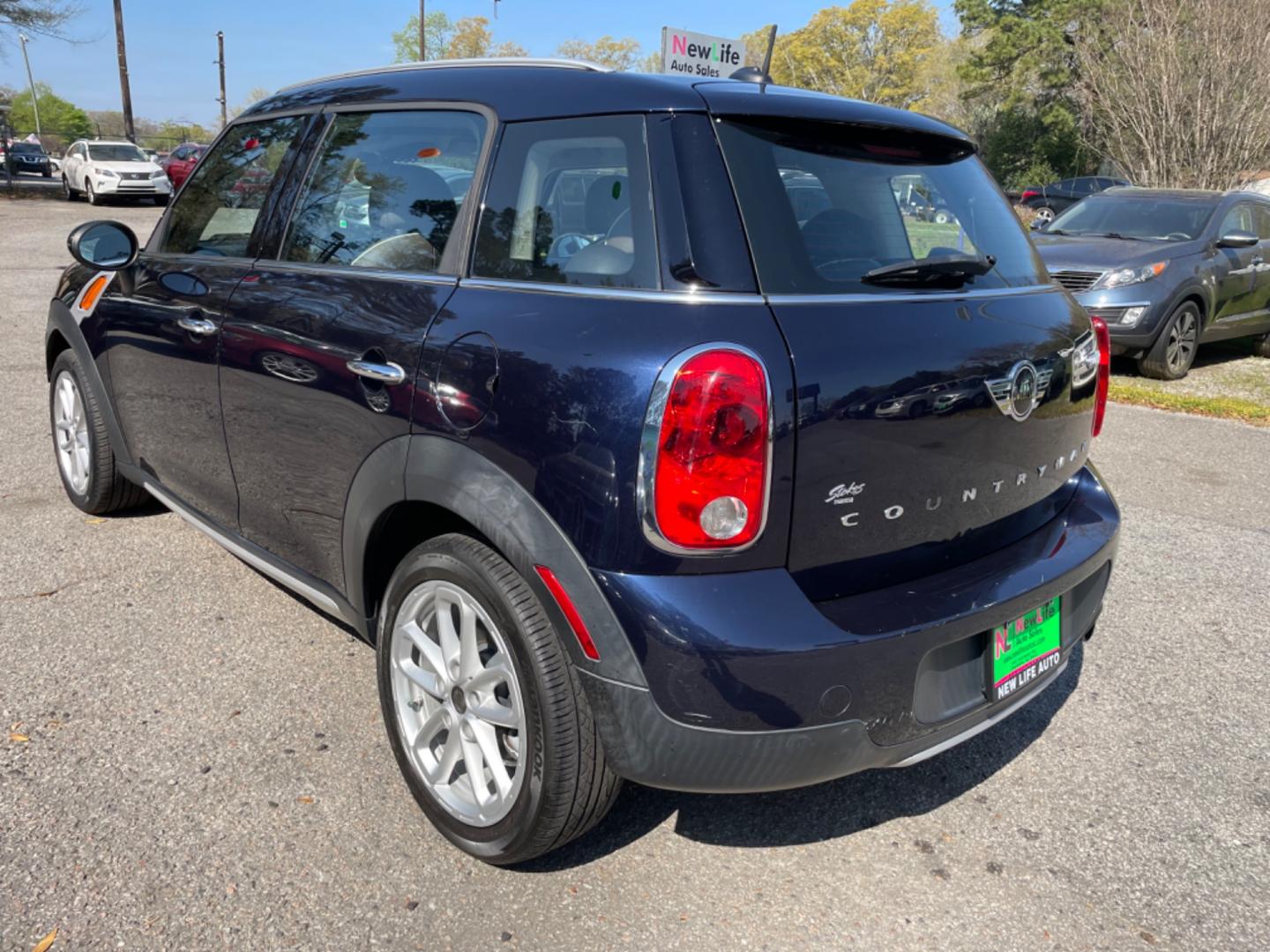 2015 BLUE MINI COUNTRYMAN COOPER (WMWZB3C55FW) with an 1.6L engine, Automatic transmission, located at 5103 Dorchester Rd., Charleston, SC, 29418-5607, (843) 767-1122, 36.245171, -115.228050 - Photo#4